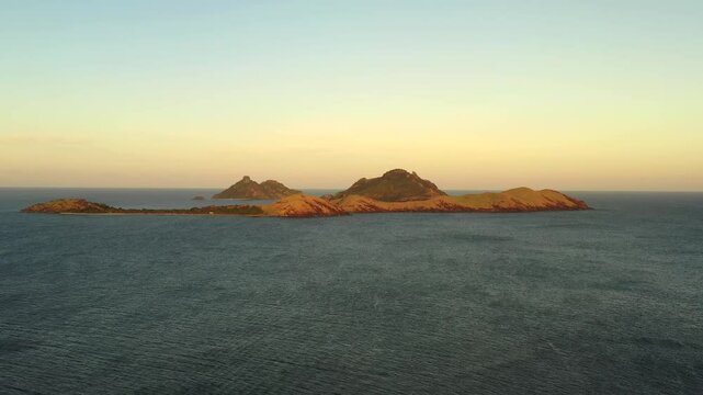 Aerial landing at Tokoriki island tourist resort at sunrise in Fiji &ndash; coral reefs tourism.
