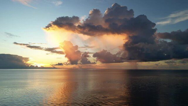 Maratua, Indonesia: Aerial drone footage of a cinematic sunset over the Celebes sea in the Maratua island in the Derawan archipelago in Borneo, Indonesia. 