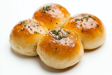 Fluffy garlic pampushky rolls gleaming with glaze on a white background showcasing deliciousness and texture