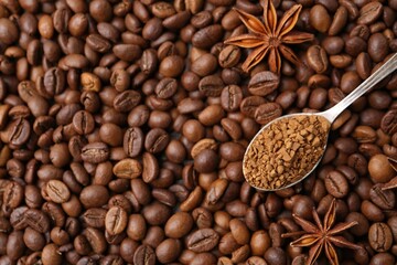 Spoon with granulated instant coffee and star anise on beans, top view. Space for text