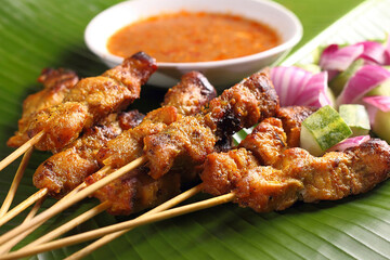 Delicious Javanese chicken satay, grilled over charcoal with fresh chicken, served with rich peanut sauce. A true taste of Indonesia!