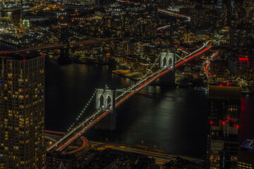 view of Brooklyn Bridge from One World Trade Center in the evening 