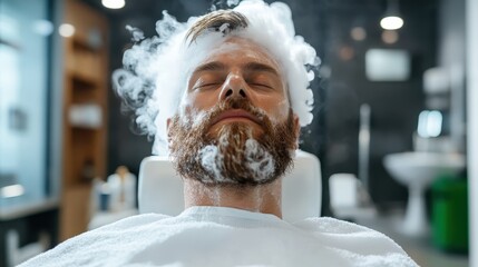 A man enjoys a serene spa experience surrounded by soothing smoke, creating a tranquil atmosphere ideal for relaxation and rejuvenation in a modern salon setting.