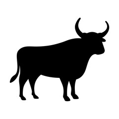 Strong black bull silhouette with curved horns standing in full profile