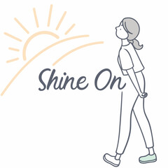 Woman walking towards the sunrise shine on