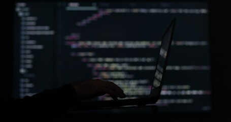 IT engineer, software developer, programmer interacts with a chatbot by creating code. Face Hacking System. Hacker attack concept. - Powered by Adobe