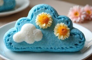 Delicious cloud bread with blue and white colors, decorated with marigold flowers. Roti Awan, trendy viral snack. Concept of sweet food, baking, desserts, confectionery, cake shop.