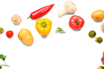 Frame made of fresh ripe vegetables on white background