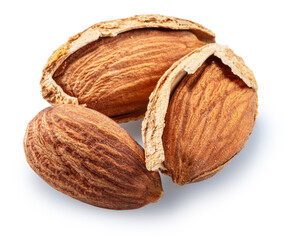 Three almond nuts in cracked shell isolated on white background. File contains clipping path.