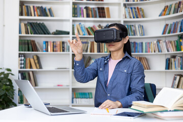 Woman in library wearing VR headset, interacting with virtual reality, using technology for...