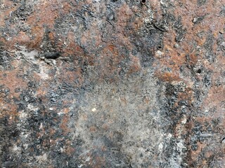 Burnt Rusted Metal Texture with Dark Corrosion Patterns. Detailed close-up of rusted, burnt metal surface with dark corrosion spots and textured grunge patterns for industrial or abstract design