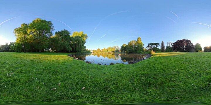 8K 360&deg; VR Video of Green Park Grass Near Water in Schoenwasser Park, Germany