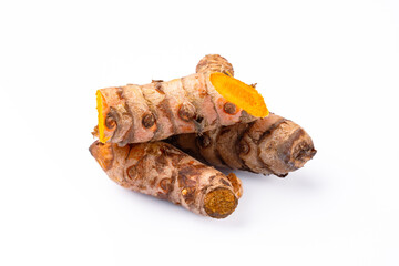 Turmeric with its magnificent orange color on a white background