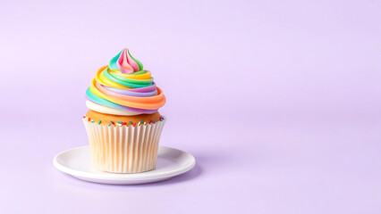 A bright cupcake with a swirl of rainbow cream on a lilac background. Suitable for advertising products, packaging and festive designs. Minimalism and color put the emphasis on the dessert.