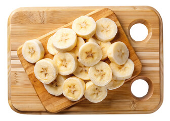 Fototapeta premium Fresh sliced banana pieces arranged on wooden cutting board, top view