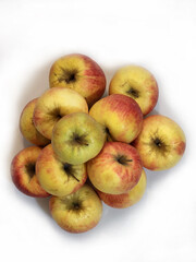 Ripe apples on a white background. Background with ripe apples
