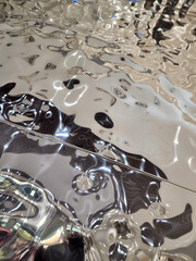 Uneven glass surface. Glass background with irregularities