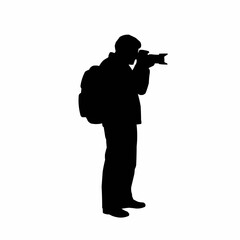 Photographer capturing image while standing on white background  