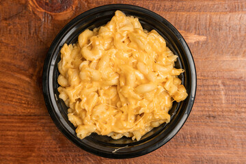 Macaroni and cheese in a container