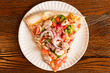 Slice of veggie pizza