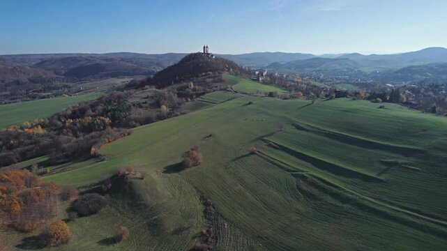 Flying over of The Calvary of Banska Stiavnica, Slovakia, a complex of churches and chapels on Scharfenberg Hill. 2x speeded up from 30 fps.