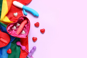 Gift box with sex toys, heart shaped candies and rainbow LGBT flag on lilac background. Valentine's...