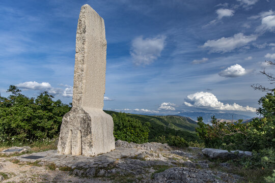 Monument symbolizing the Glagolitic alphabet, view of the panorama of the island of KRK