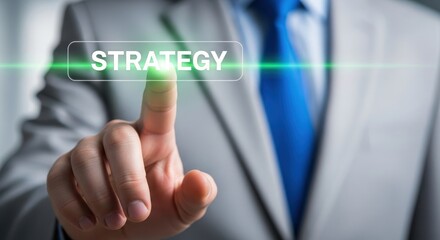 Businessman hand touching a virtual screen with the word strategy, concept of business planning.