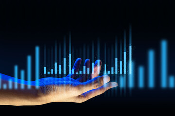hand of businessman interactive touching a holographic of transaction financial network data...
