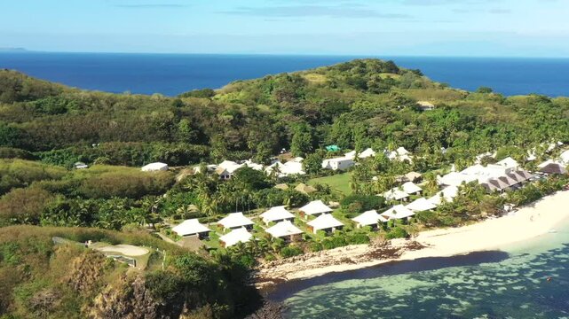 Scenic coral reefs around Tokoriki island in Fiji Mamanuca islands aerial panorama.
