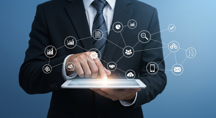 Businessman using tablet with digital network interface