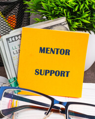 A conceptual phrase on the topic of business MENTOR SUPPORT. BUSINESS EDUCATION TRAINING COACHING...