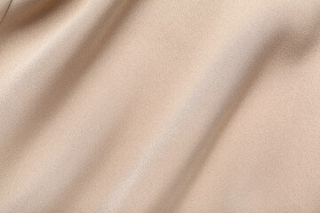 Fototapeta premium Texture of beige fabric as background