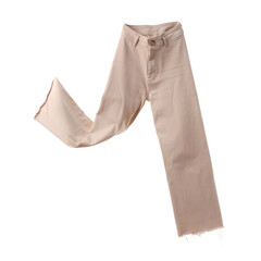 Flying beige pants on white background