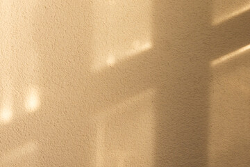 Sunny glare on rough wall. Abstract background