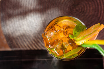 cold and refreshing orange punch cocktail, summer drink