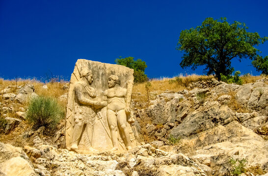 Nemrut or Nemrud archeological site in Turkey. Nemrut Dag high mountain in Adiyaman, summit with large statues in a royal tomb from ancient times. King Antiochus I Theos of Commagene tomb-sanctuary