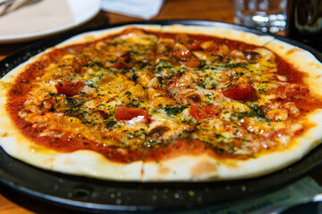 pizza on the dish at the restaurant