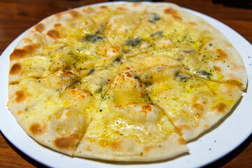pizza on the dish at the restaurant
