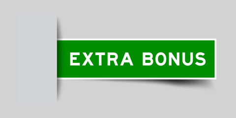Green color square shape sticker label with word extra bonus inserted in gray background