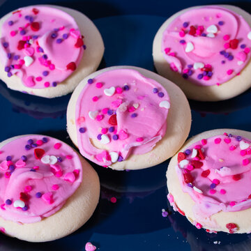 Five large cookies in an X shape or composition.