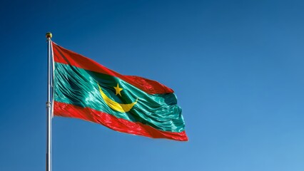 Mauritania flag waving proudly in celebration of independence day under a clear blue sky