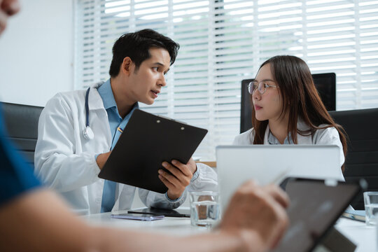 Medical, meeting and laptop for team in office in discussion, brainstorming and planning. Doctor, nurse and computer on desk, teamwork or workshop for data analytics.