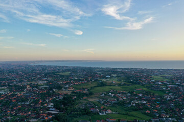 Sunset Panorama of Balinese Homes with Ocean View