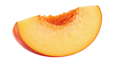 Close up of a fresh peach slice isolated on a solid black background
