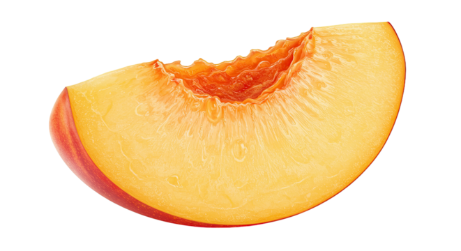 Close up of a fresh peach slice isolated on a solid black background