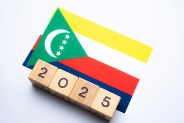 2025, Comoros flag with date block, Concept, Important events for Comoros the new year, election,...