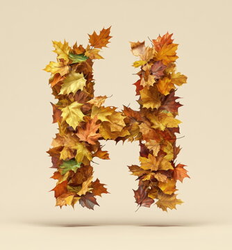 The letter "H" is made of falling autumn leaves