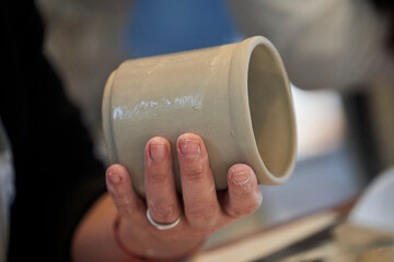 Shape clay with hands