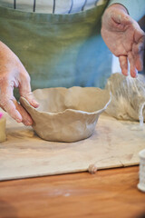 Shape clay with hands